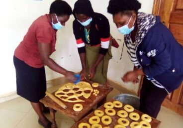 Women in Uganda cooking